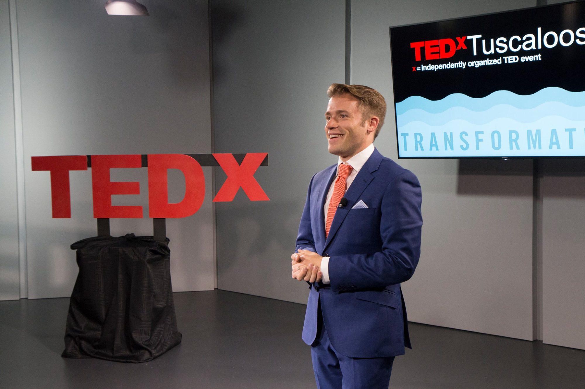 Dr. Adam Brooks on the TEDx stage